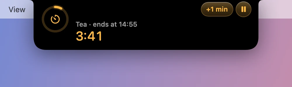The glance on a named timer, Tea, with +1 min and pause buttons.